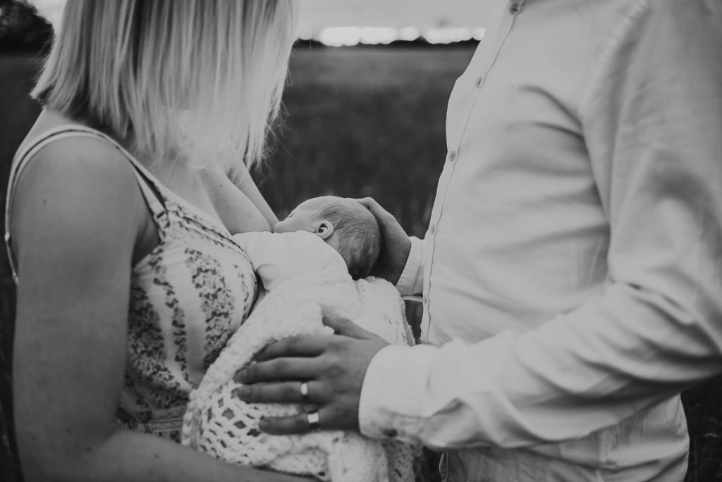 outdoor newborn photography during sunset