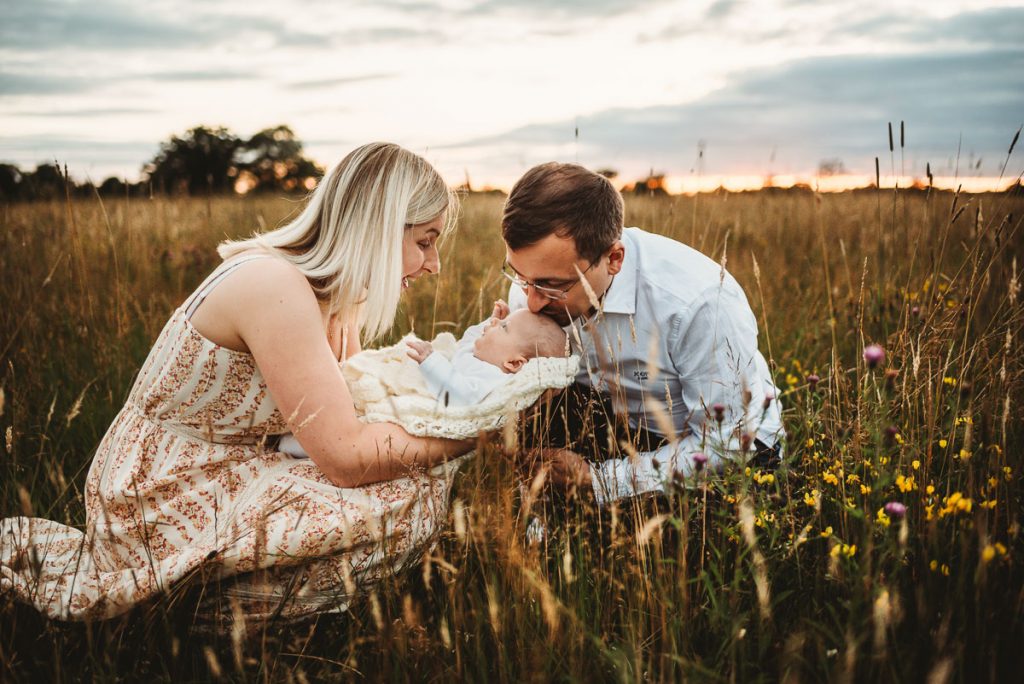 newborn photography outside at sunset