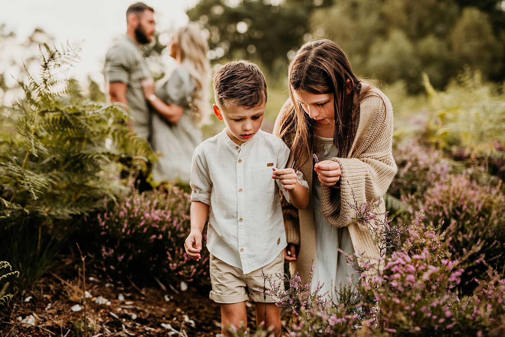 children holding purple heather