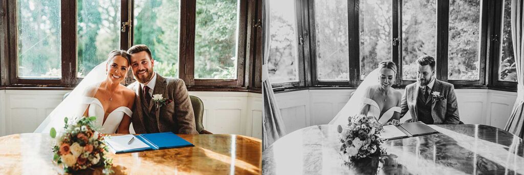 bride and groom posing whilst signing the register at Highley Manor