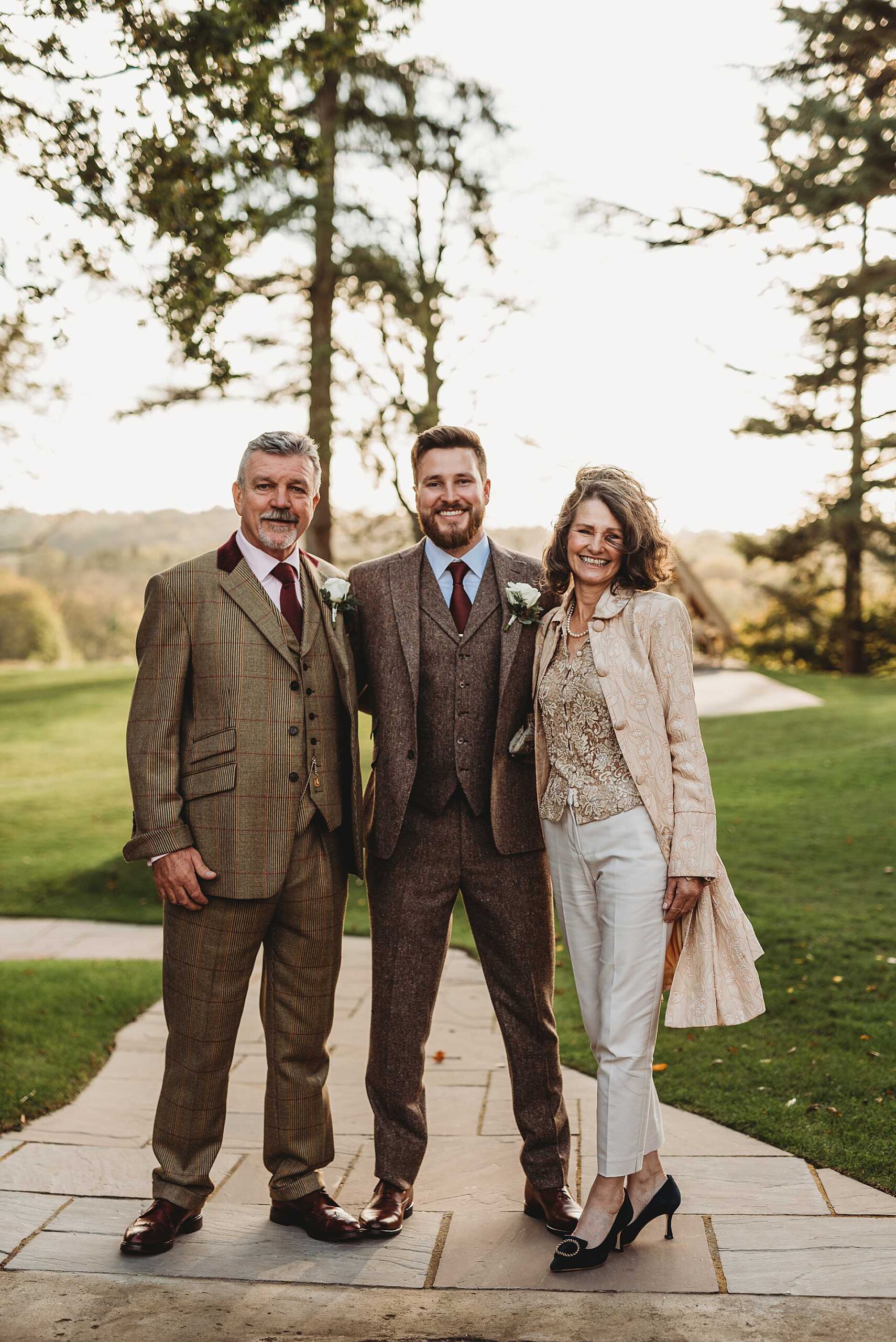 groom with his mother and father
