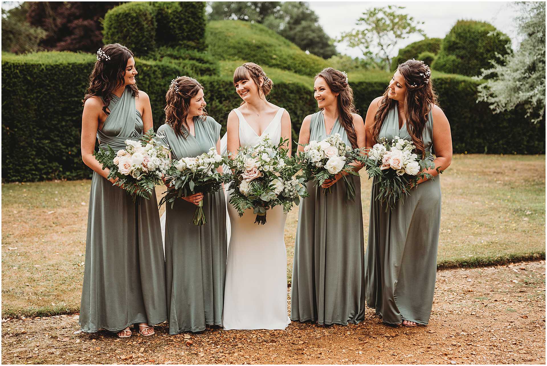 bride and bridesmaids formal shots at wedding at hale park