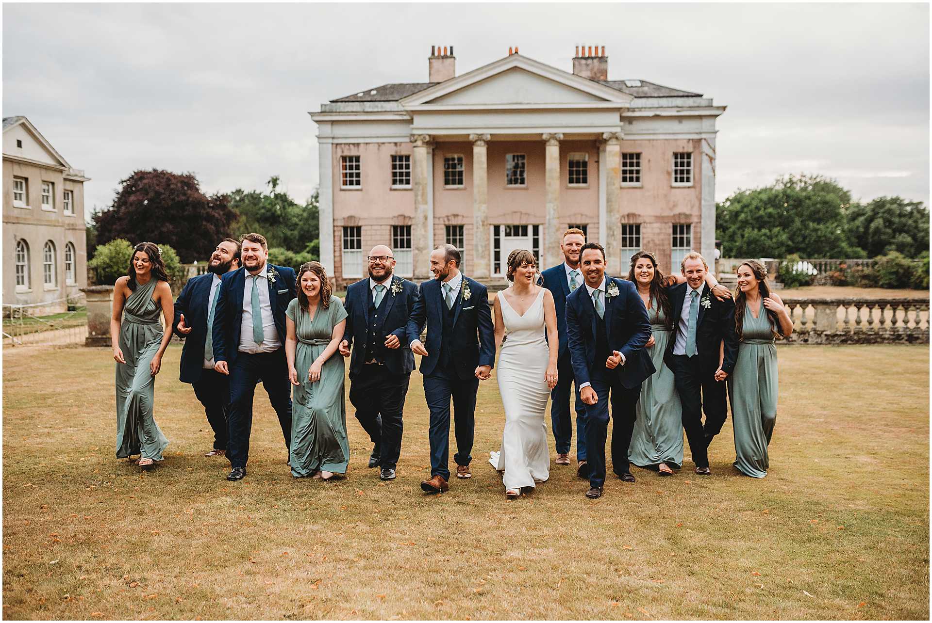 bridal party shots in front of the house at hale park