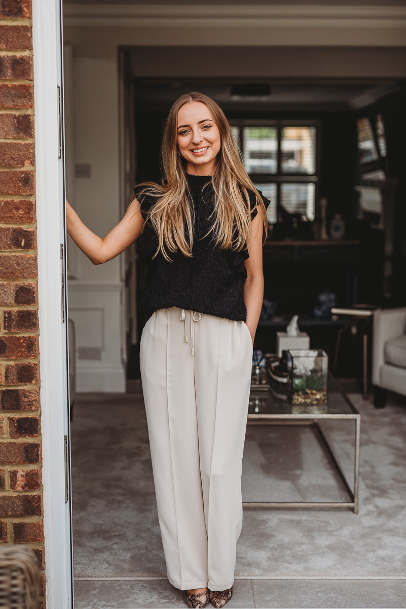 girl standing in doorway