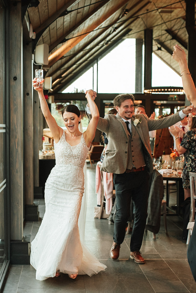 bride and groom dancing as they enter their wedding breakfast at Syrencot House