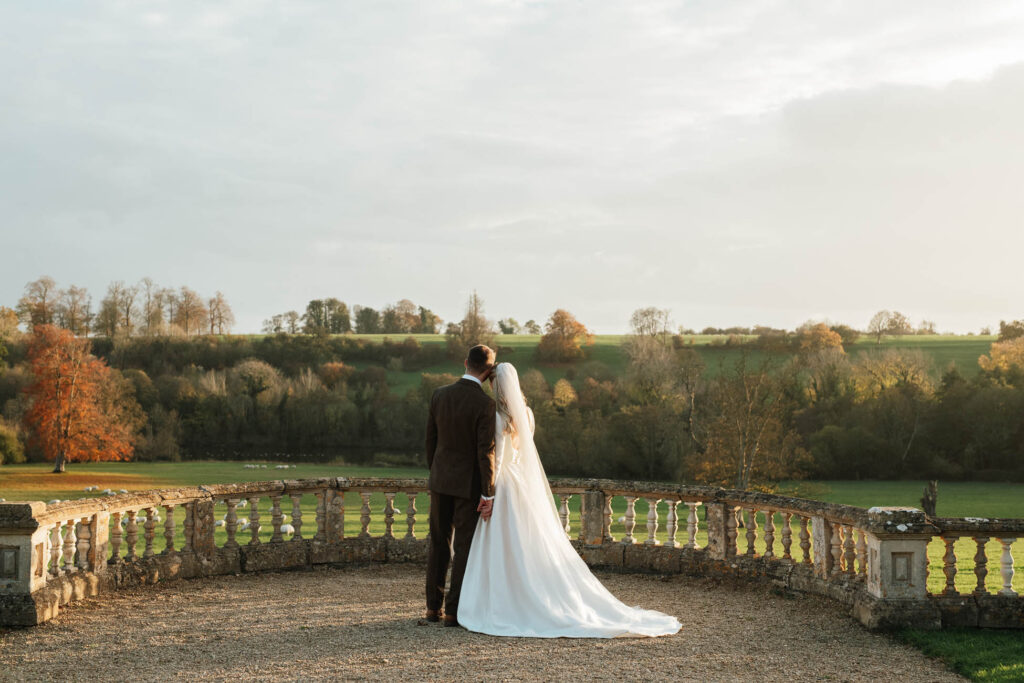 Relaxed couple portraits after a wedding ceremony in the Cotswolds