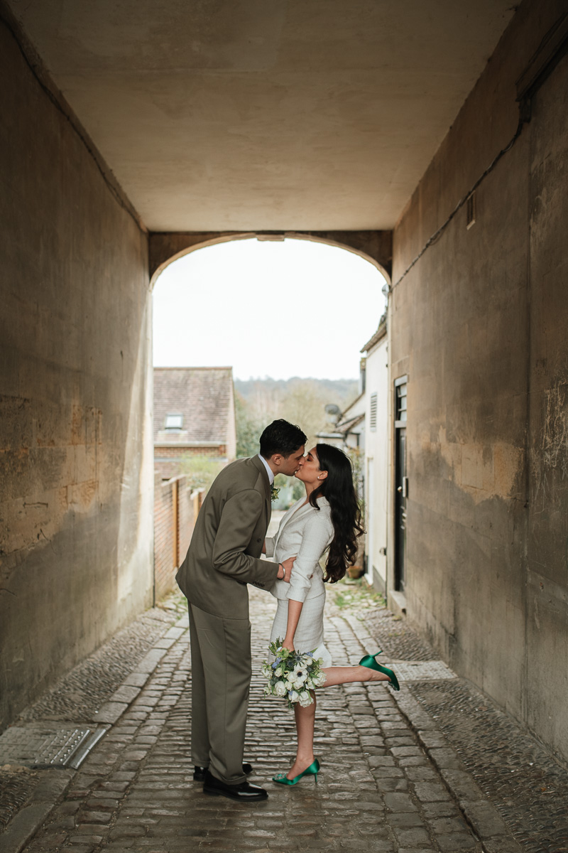 Wedding Photographer in Wiltshire bride and groom share an intimate moment after their micro wedding in Marlborough town hall