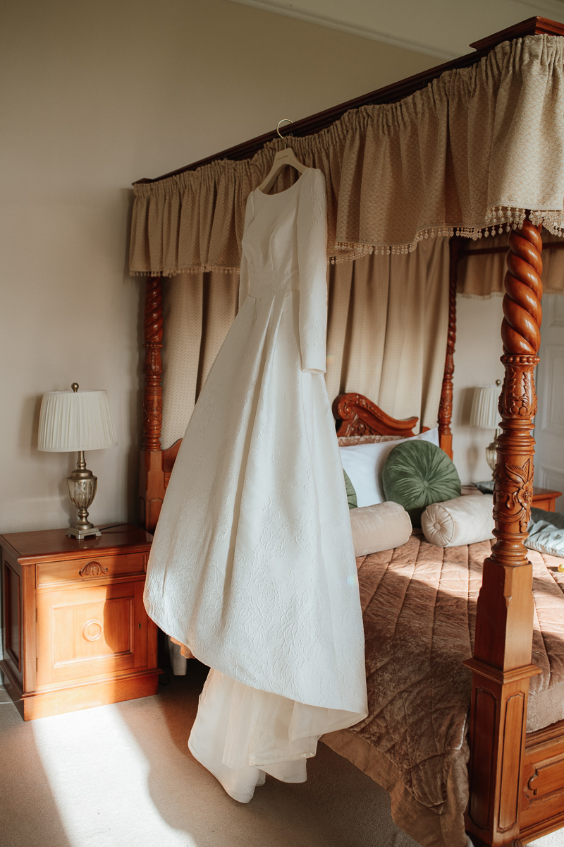Orchardleigh Estate winter wedding dress hanging in bridal suite