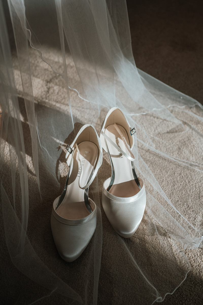 Bridal shoes at Orchardleigh Estate wedding